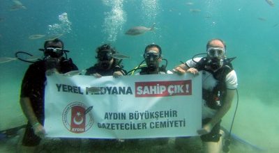 Gazetecilerden suyun altında ‘Yerel Medya’ pankartı
